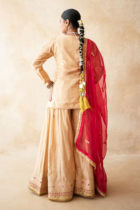 Shop Gulabo Jaipur Gold Silk Embroidery, Sequins Split V-neck Neena Hand Work Kurta And Sharara Set at Aza Fashions Shop_Gulabo Jaipur_Gold Silk Embroidery, Sequins Split V-neck Neena Hand Work Kurta And Sharara Set _at_Aza_Fashions