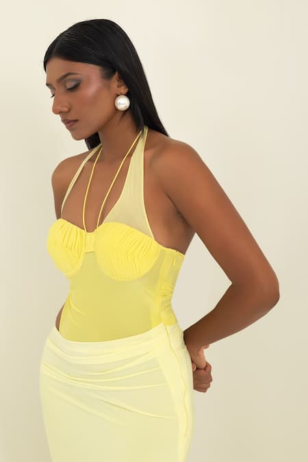 Pinup By Astha_Yellow Lycra Pom-poms Halter Neck Ruched Bust Cut-out Gown _Online_at_Aza_Fashions