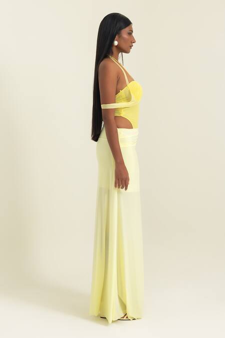 Pinup By Astha_Yellow Lycra Pom-poms Halter Neck Ruched Bust Cut-out Gown _at_Aza_Fashions