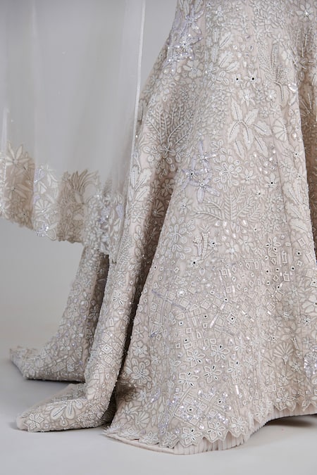 Mishru_Ivory Tulle Applique, Embroidery, Sequins Sweetheart Opaline Corset Lehenga Set _at_Aza_Fashions