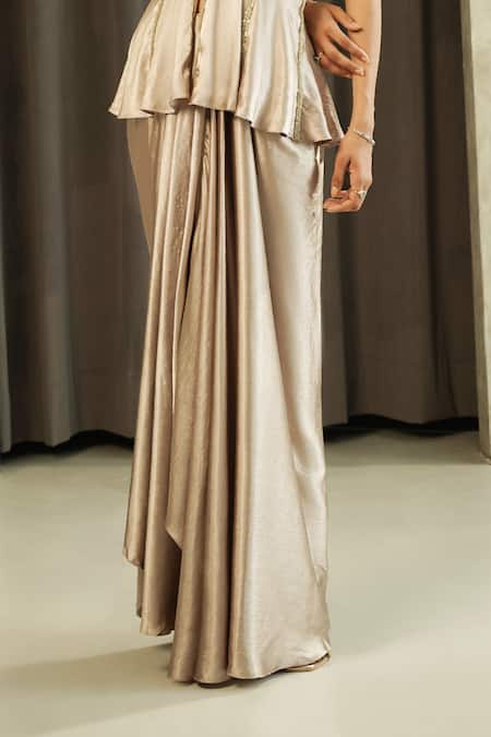 Muskan Aggarwal_Gold Satin, Silk Embroidery, Aurea Floral Peplum Top And Draped Skirt Set _Online_at_Aza_Fashions