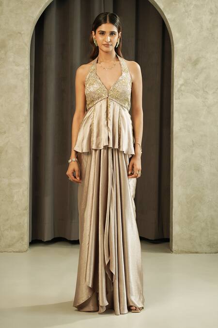 Shop_Muskan Aggarwal_Gold Satin, Silk Embroidery, Aurea Floral Peplum Top And Draped Skirt Set _Online_at_Aza_Fashions