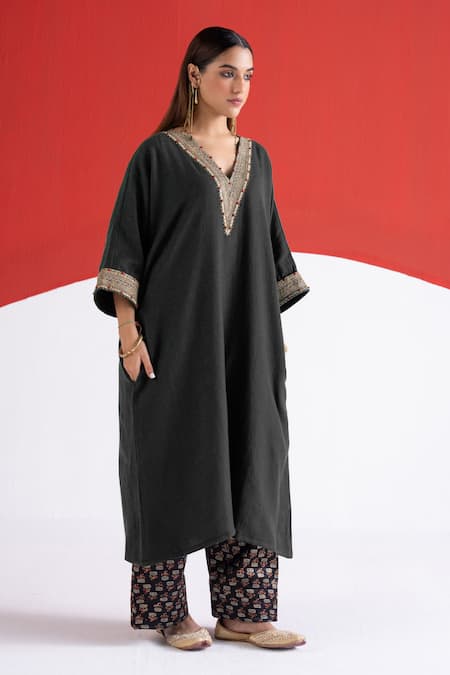 Buy TA’Assur Black Wool Embroidery, Beads V-neck Roha Neckline Phiran Kurta Online at Aza Fashions Buy_TA’Assur_Black Wool Embroidery, Beads V-neck Roha Neckline Phiran Kurta _Online_at_Aza_Fashions
