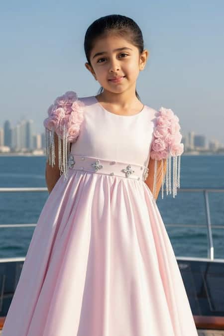 Fayon Kids Pink Satin Fabric Flowers, Tassels Placement Floral Applique Gown Online at Aza Fashions Fayon Kids_Pink Satin Fabric Flowers, Tassels Placement Floral Applique Gown _Online_at_Aza_Fashions