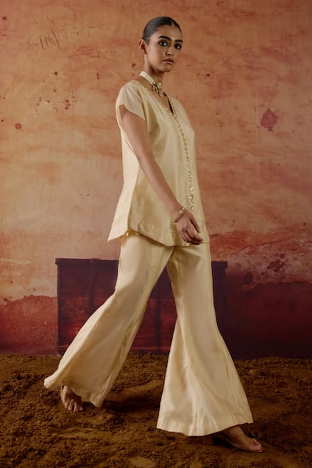 Shop Vinita Bhansali Ivory Silk Embroidery, Sequins, Zari V-neck Vaza Top And Palazzo Set Online at Aza Fashions Shop_Vinita Bhansali_Ivory Silk Embroidery, Sequins, Zari V-neck Vaza Top And Palazzo Set _Online_at_Aza_Fashions