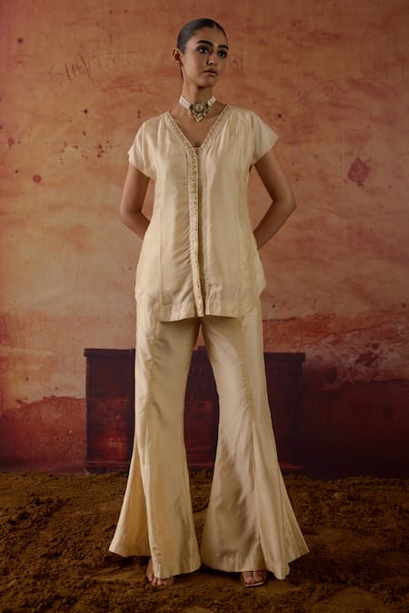 Vinita Bhansali Ivory Silk Embroidery, Sequins, Zari V-neck Vaza Top And Palazzo Set at Aza Fashions Vinita Bhansali_Ivory Silk Embroidery, Sequins, Zari V-neck Vaza Top And Palazzo Set _at_Aza_Fashions