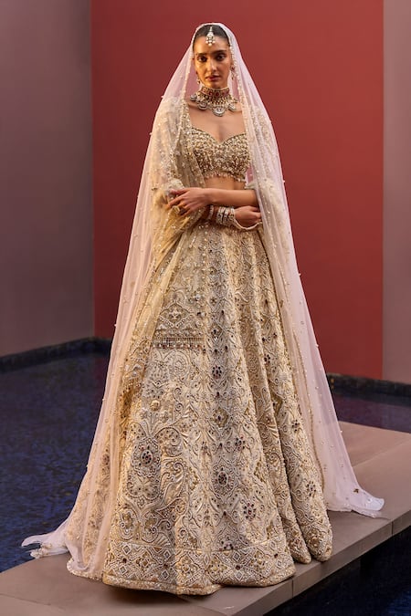 Tamanna Punjabi Kapoor Ivory Silk, Net Embroidery, Sequins, Stones, Embellished Lehenga Blouse Set Online at Aza Fashions Tamanna Punjabi Kapoor_Ivory Silk, Net Embroidery, Sequins, Stones, Embellished Lehenga Blouse Set _Online_at_Aza_Fashions