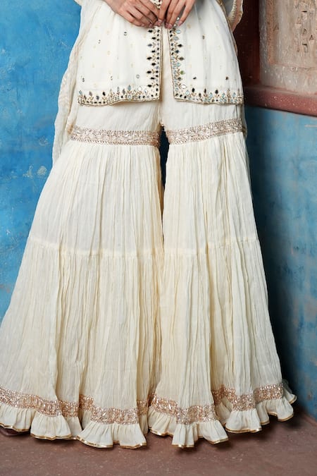 Nazar By Indu Ivory Cotton Mirrors, Embroidery, Gota Patti Scoop Strappy Kurta Sharara Set Online at Aza Fashions Nazar By Indu_Ivory Cotton Mirrors, Embroidery, Gota Patti Scoop Strappy Kurta Sharara Set _Online_at_Aza_Fashions