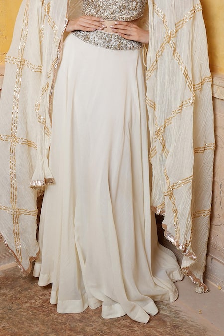 Nazar By Indu Ivory Cotton Sequins, Metallic Thread, Blouse And Fluid Skirt Lehenga Set Online at Aza Fashions Nazar By Indu_Ivory Cotton Sequins, Metallic Thread, Blouse And Fluid Skirt Lehenga Set _Online_at_Aza_Fashions