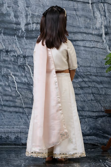 Shop MI Dulce AN'YA Gold Tissue, Silk Mirrors, Embroidery, Sequins, Metallic Thread Lehenga Set at Aza Fashions Shop_MI Dulce AN'YA_Gold Tissue, Silk Mirrors, Embroidery, Sequins, Metallic Thread Lehenga Set _at_Aza_Fashions