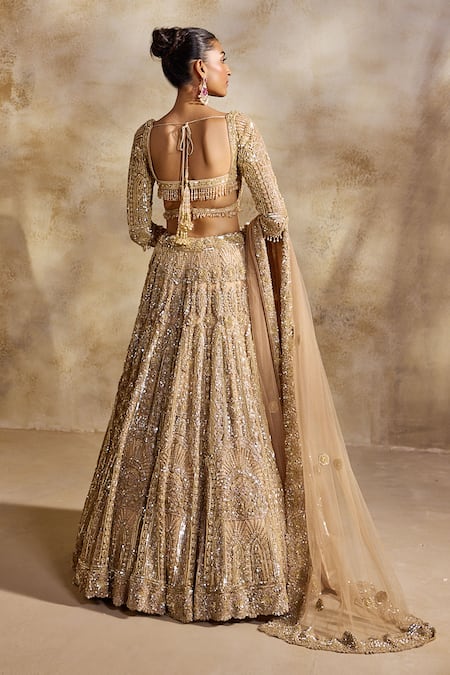 Nitika Gujral Embellished Champagne Gold Lehenga Set 