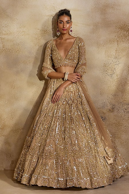 Nitika Gujral Embellished Champagne Gold Lehenga Set 