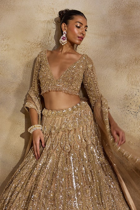 Nitika Gujral Gold Net, Satin Beads, Sequins, Crystals, Embellished Champagne Lehenga Set at Aza Fashions Nitika Gujral_Gold Net, Satin Beads, Sequins, Crystals, Embellished Champagne Lehenga Set _at_Aza_Fashions