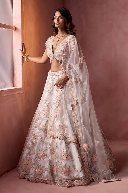 Nitika Gujral_White Net, Satin Applique, Beads, Sequins, Crystals V-neck Leather Lehenga Set _at_Aza_Fashions