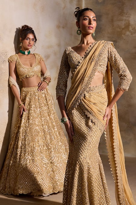 Shop Nitika Gujral Gold Net, Satin Beads, Sequins, Crystals, Pre-draped Lehenga Saree With Blouse Online at Aza Fashions Shop_Nitika Gujral_Gold Net, Satin Beads, Sequins, Crystals, Pre-draped Lehenga Saree With Blouse _Online_at_Aza_Fashions