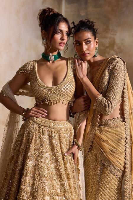 Nitika Gujral Gold Net, Satin Beads, Sequins, Crystals, Pre-draped Lehenga Saree With Blouse at Aza Fashions Nitika Gujral_Gold Net, Satin Beads, Sequins, Crystals, Pre-draped Lehenga Saree With Blouse _at_Aza_Fashions