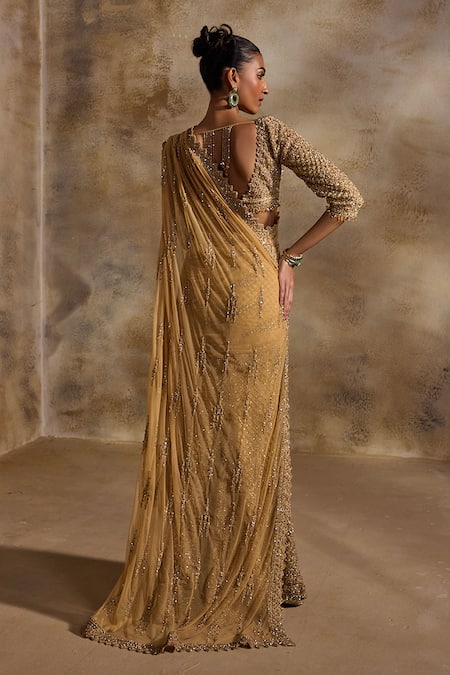Nitika Gujral Gold Net Pre-Draped Lehenga Saree With Blouse 