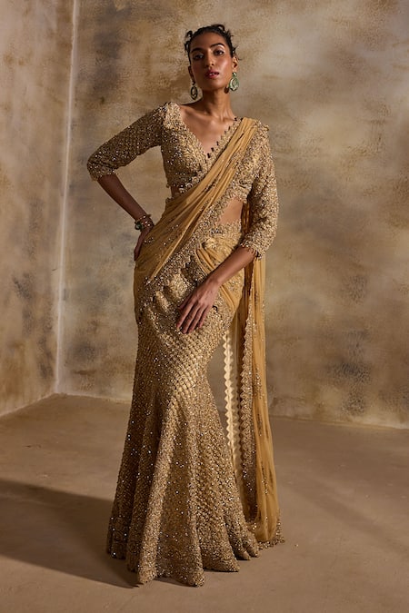 Nitika Gujral Gold Net Pre-Draped Lehenga Saree With Blouse 