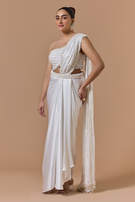 Nitika Gujral Ivory Satin, Net, Shantoon Pearls, Crystals, Pre-draped Saree With Blouse Online at Aza Fashions Nitika Gujral_Ivory Satin, Net, Shantoon Pearls, Crystals, Pre-draped Saree With Blouse _Online_at_Aza_Fashions