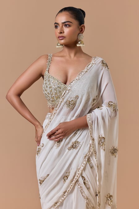 Buy Nitika Gujral Cream Shantoon, Satin, Net Embroidery, Shimmer Pre-draped Saree With Blouse Online at Aza Fashions Buy_Nitika Gujral_Cream Shantoon, Satin, Net Embroidery, Shimmer Pre-draped Saree With Blouse _Online_at_Aza_Fashions