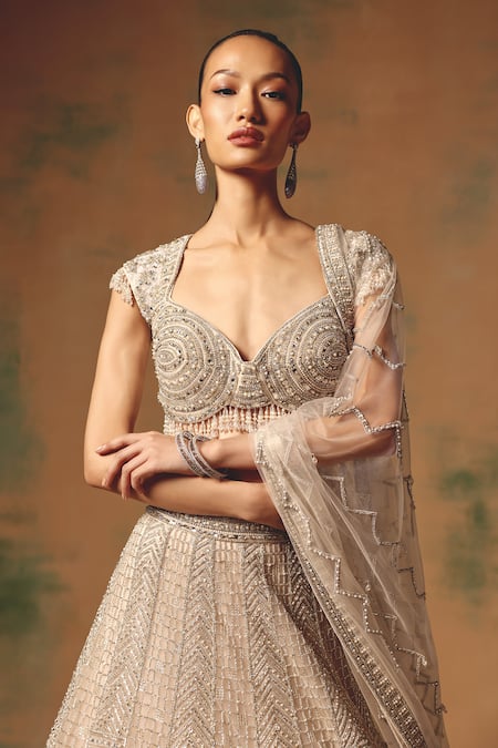 Basanti - Kapde Aur Koffee Ivory Net Sequins, Beads, Embroidery, Metallic The Echo Of Beige Lehenga Set at Aza Fashions Basanti - Kapde Aur Koffee_Ivory Net Sequins, Beads, Embroidery, Metallic The Echo Of Beige Lehenga Set _at_Aza_Fashions