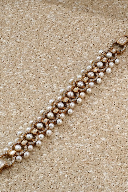 Tarun Tahiliani Gold Plated Pearls, Diamonds, Stones Embellished Bracelet Online at Aza Fashions Tarun Tahiliani_Gold Plated Pearls, Diamonds, Stones Embellished Bracelet _Online_at_Aza_Fashions