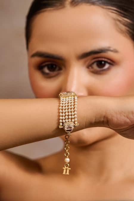 Tarun Tahiliani Gold Plated Pearls, Diamonds, Stones, Crystals Handcrafted Embellished Bracelet Online at Aza Fashions Tarun Tahiliani_Gold Plated Pearls, Diamonds, Stones, Crystals Handcrafted Embellished Bracelet _Online_at_Aza_Fashions