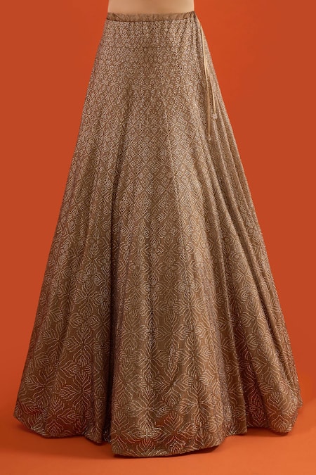 Seema Gujral Gold Net Embroidery, Sequins One Shoulder Lehenga With Draped Blouse at Aza Fashions Seema Gujral_Gold Net Embroidery, Sequins One Shoulder Lehenga With Draped Blouse _at_Aza_Fashions