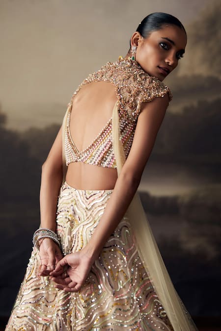 Ohaila Khan_Gold Tulle, Silk Pearls, Crystals, Sequins, Beads, Lehenga And Blouse Set _at_Aza_Fashions