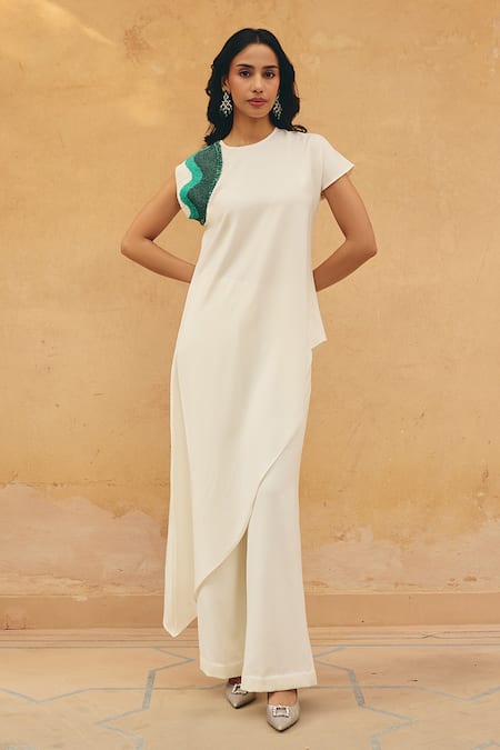 Maenaam Ivory Polyester, Satin Sequins, Embroidery Margot Asymmetric Top And Pant Set Online at Aza Fashions Maenaam_Ivory Polyester, Satin Sequins, Embroidery Margot Asymmetric Top And Pant Set _Online_at_Aza_Fashions