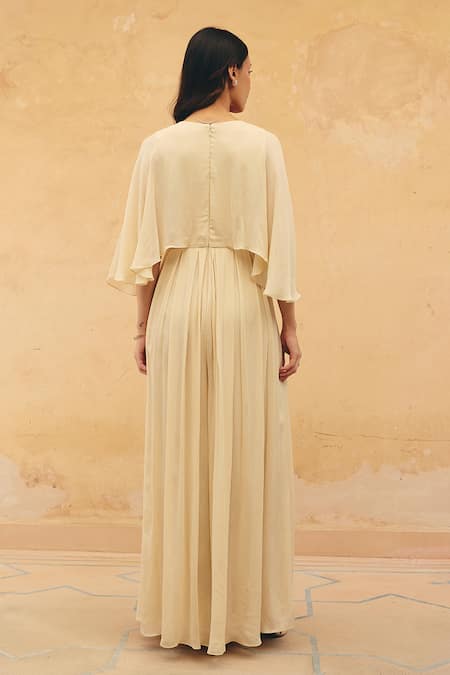 Shop Maenaam Beige Crepe Sequins, Beads Square Neck Eisen Hand Embroidered Pleated Jumpsuit at Aza Fashions Shop_Maenaam_Beige Crepe Sequins, Beads Square Neck Eisen Hand Embroidered Pleated Jumpsuit _at_Aza_Fashions