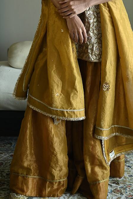 Buy_Shorshe Clothing_Gold Brocade, Tissue Embroidery, Lace V-neck Sitara Hand Kurta And Sharara Set _Online_at_Aza_Fashions