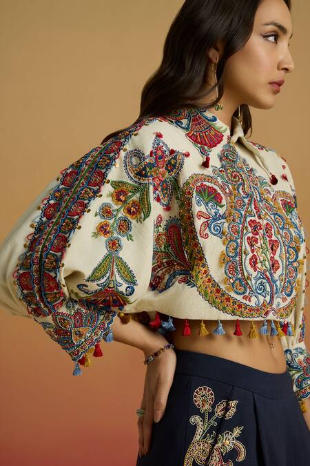 Shop_Chandrima_Ivory Cotton Beads, Tassels Collared Embroidered Kimono Bolero Jacket _Online_at_Aza_Fashions