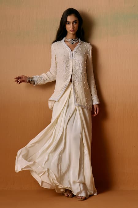 Saniya Sharma Ivory Organza, Crepe Pearls, Sequins, Aurea Jacket And Draped Skirt Set Online at Aza Fashions Saniya Sharma_Ivory Organza, Crepe Pearls, Sequins, Aurea Jacket And Draped Skirt Set _Online_at_Aza_Fashions