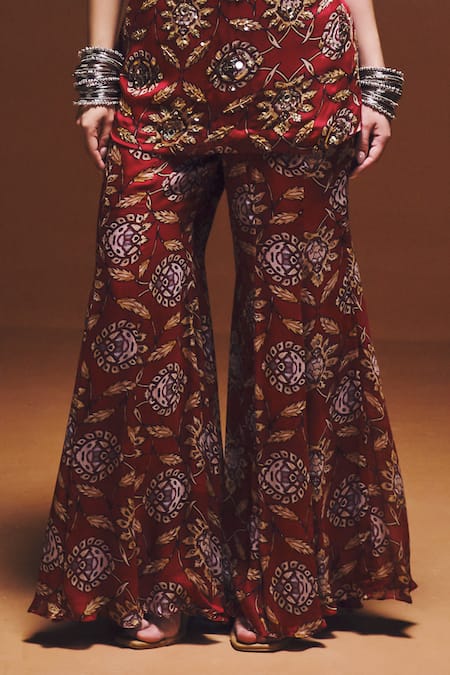 Saniya Sharma Red Georgette Embroidery, Sequins, Zari Sweetheart Nura Peplum Top With Sharara at Aza Fashions Saniya Sharma_Red Georgette Embroidery, Sequins, Zari Sweetheart Nura Peplum Top With Sharara _at_Aza_Fashions