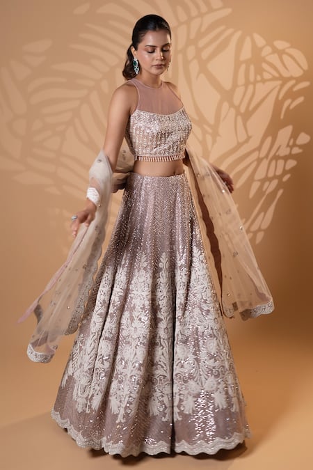 Jiya by Veer Design Studio_Pink Net Sequins, Beads, Embroidery Halter Neck, Keyhole Dusty Rose Lehenga Set _Online_at_Aza_Fashions
