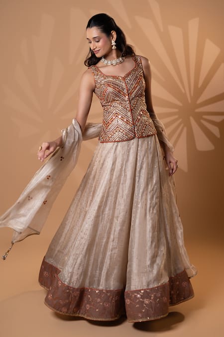 Jiya by Veer Design Studio_Rust Net Embroidery, Sequins, Beads Sweetheart Neck Blouse Lehenga Set _Online_at_Aza_Fashions