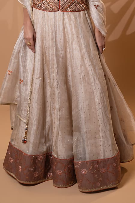 Buy_Jiya by Veer Design Studio_Rust Net Embroidery, Sequins, Beads Sweetheart Neck Blouse Lehenga Set _Online_at_Aza_Fashions