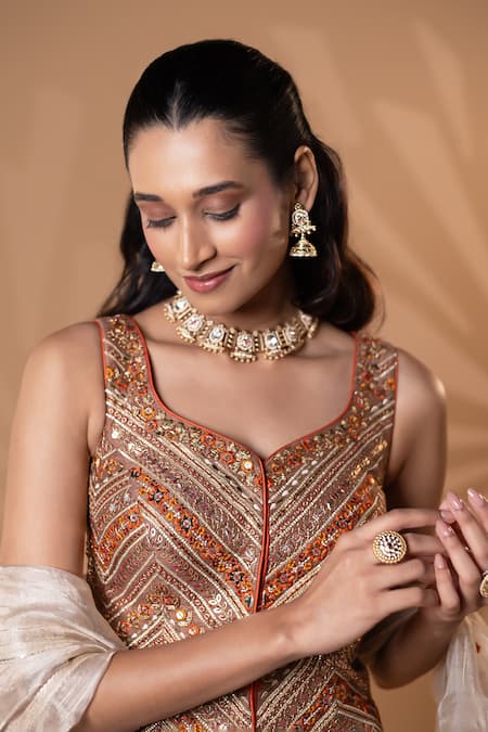 Jiya by Veer Design Studio_Rust Net Embroidery, Sequins, Beads Sweetheart Neck Blouse Lehenga Set _at_Aza_Fashions