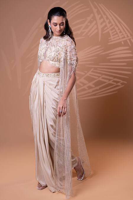 Jiya by Veer Design Studio_Beige Crepe Beads, Sequins Round Neck Embellished Cape Draped Skirt Set _Online_at_Aza_Fashions