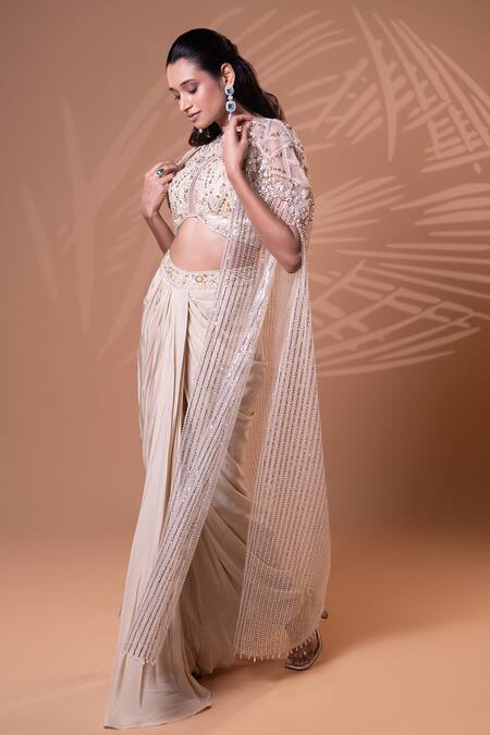 Buy_Jiya by Veer Design Studio_Beige Crepe Beads, Sequins Round Neck Embellished Cape Draped Skirt Set _Online_at_Aza_Fashions