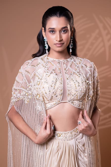 Shop_Jiya by Veer Design Studio_Beige Crepe Beads, Sequins Round Neck Embellished Cape Draped Skirt Set _Online_at_Aza_Fashions