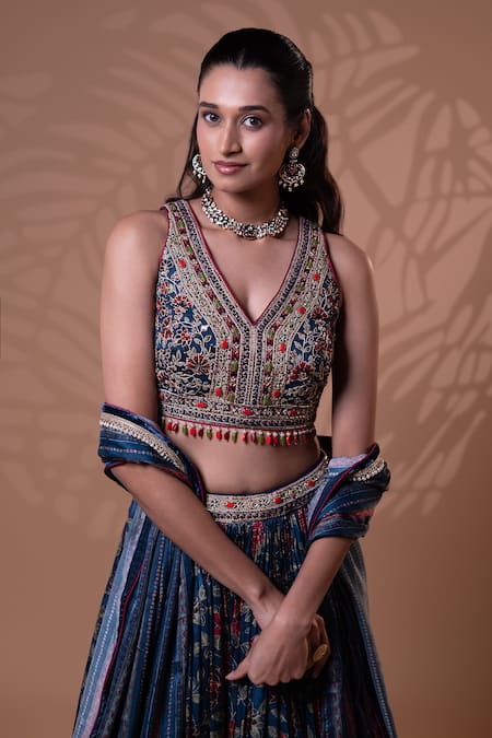 Shop_Jiya by Veer Design Studio_Blue Embroidery, Mirrors, Tassels V-neck Midnight Bloom Lehenga Set _Online_at_Aza_Fashions
