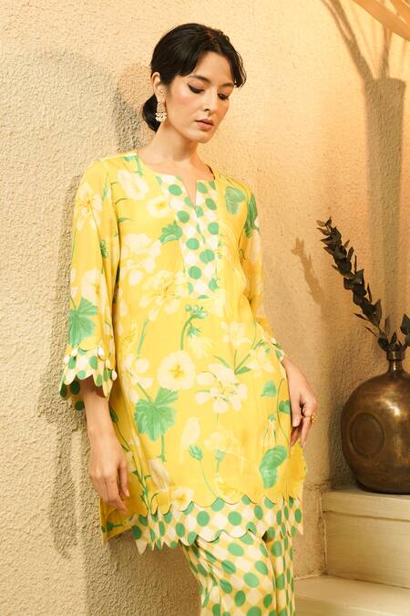 Shop_Surabhi Arya_Yellow Muslin Piping, Pom-poms V-neck Floral Print And Pant Set _Online_at_Aza_Fashions