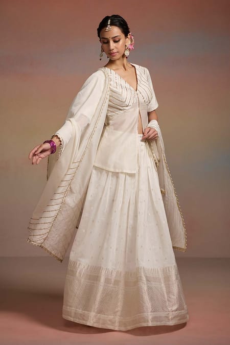 Shop_Dressfolk_Ivory Silk Zari, Sequins, Embroidery, Beads Triptika Woven Kurta Lehenga Set _Online_at_Aza_Fashions