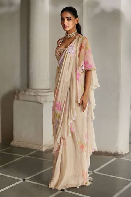 Shop Paulmi And Harsh Ivory Chiffon Embroidery, Fringe, Ruffle Printed Pre-draped Saree With Blouse Online at Aza Fashions Shop_Paulmi And Harsh_Ivory Chiffon Embroidery, Fringe, Ruffle Printed Pre-draped Saree With Blouse _Online_at_Aza_Fashions