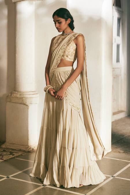 Shop_Paulmi And Harsh_Ivory Georgette, Satin Embroidery, Sequins, Tiered Pre-draped Saree With Blouse _Online_at_Aza_Fashions