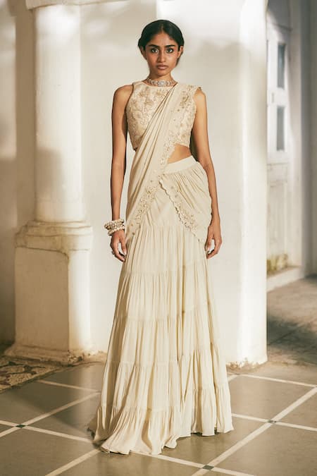 Paulmi And Harsh_Ivory Georgette, Satin Embroidery, Sequins, Tiered Pre-draped Saree With Blouse _at_Aza_Fashions