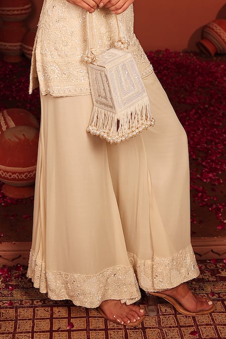 Shop_Tasuvure Indes_Ivory Georgette, Chiffon Sequins, Embroidery Inaaya Cutdana Kurta And Sharara Set _Online_at_Aza_Fashions