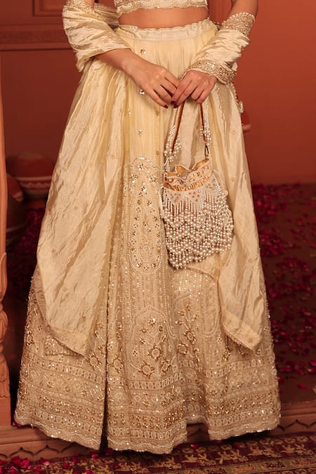 Buy_Tasuvure Indes_Ivory Georgette, Chiffon Sequins, Beads, Inaaya Cutdana Embroidered Lehenga Set _Online_at_Aza_Fashions